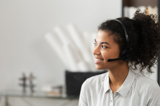 African American young lady wearing a headset