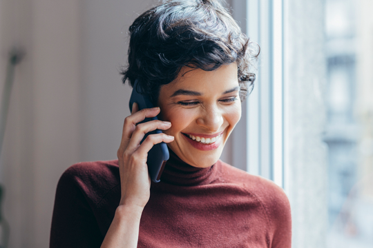 Happy woman on phone